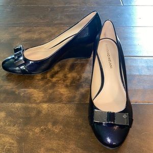 Black leather wedges, 2 in. Like new.